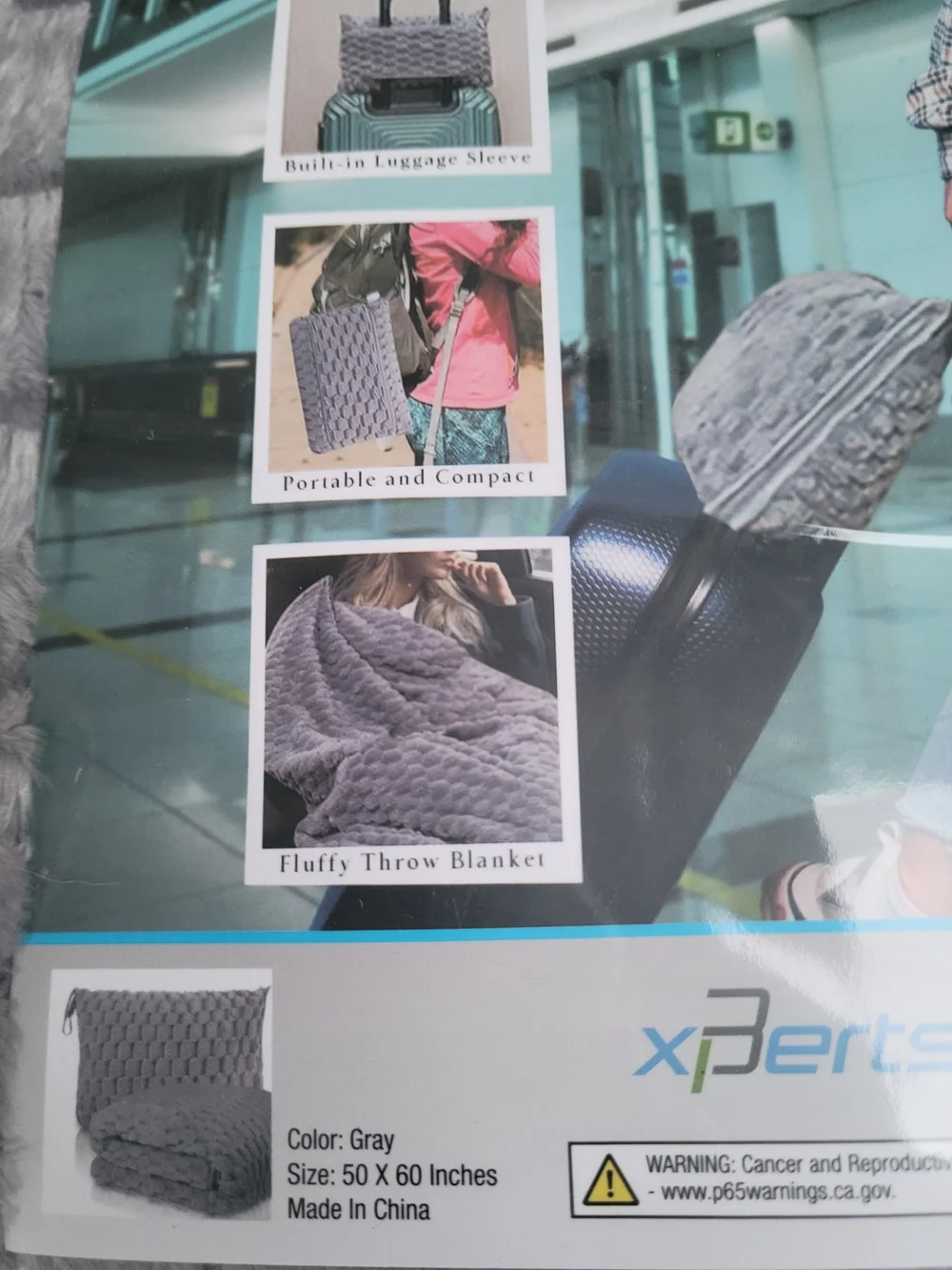 Xperts brand 2-in-1 set  a gray, textured blanket that transforms into a Pillow